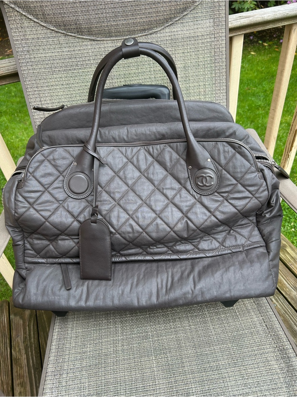 CHANEL Black Quilted Leather Rolling Travel Bag